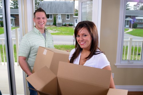 Professional movers handling a local Chinatown relocation